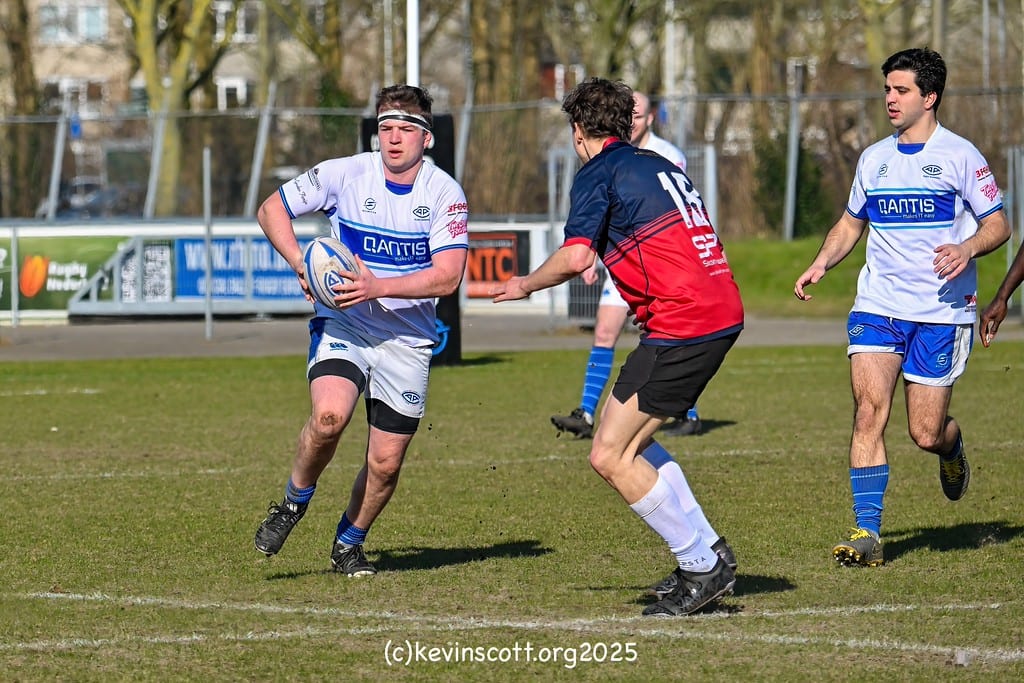 AAC ball-carrier breaks clear against Amsterdam RC