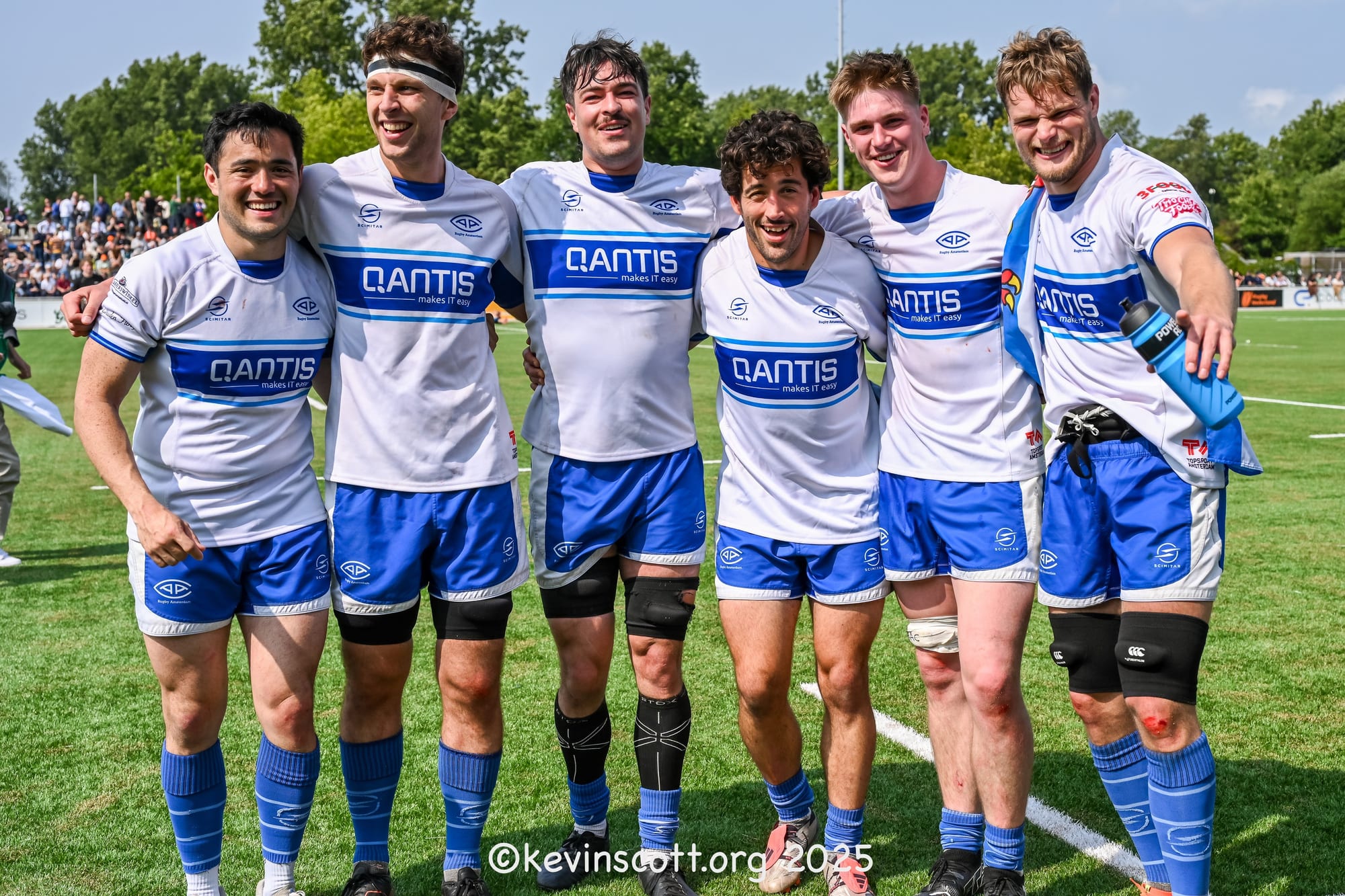 AAC players gather for a photo after beating Utrecht USRS